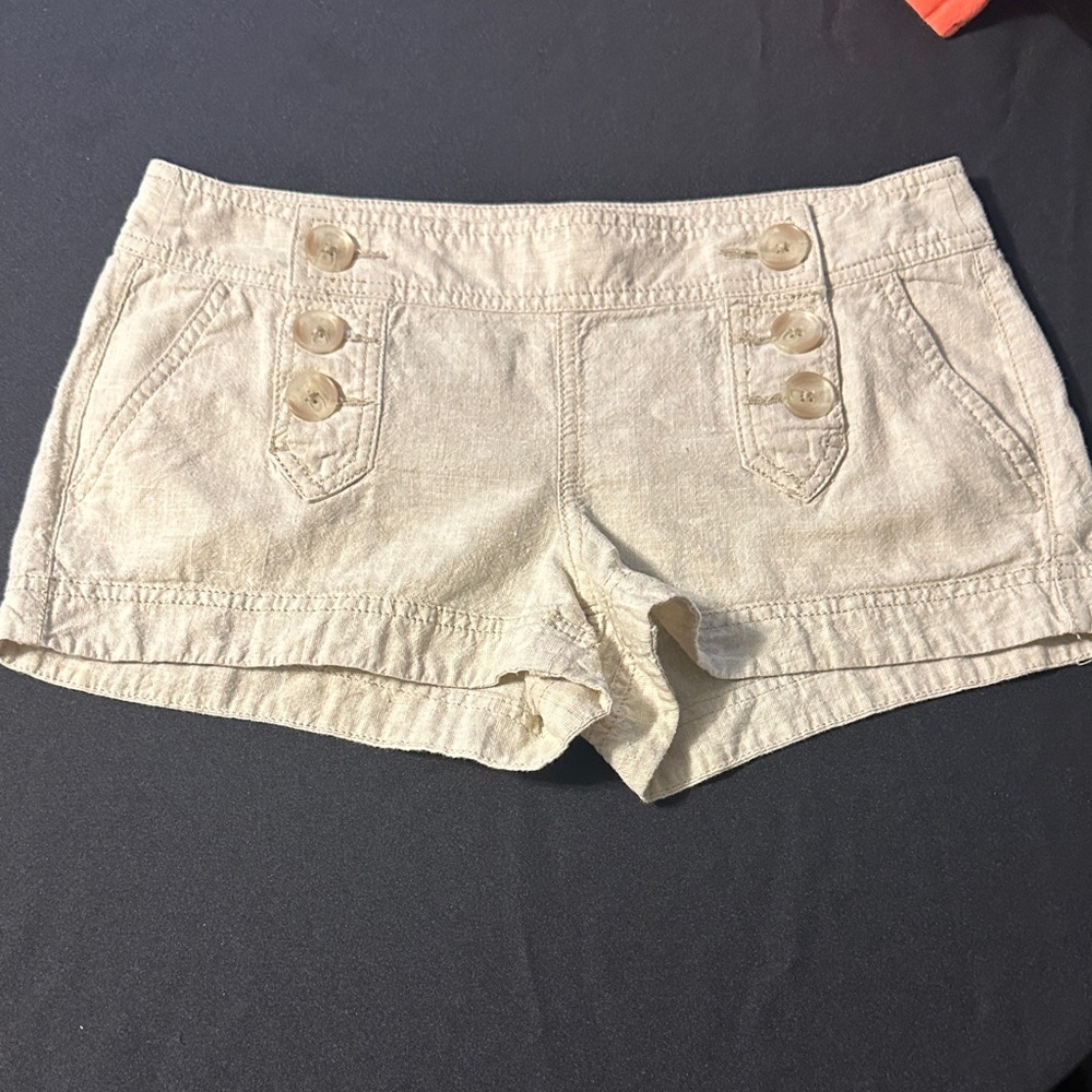 Express High Waist Cream Shorts with Button Accents